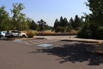 Two of several accessible parking spaces near playground and Nature House